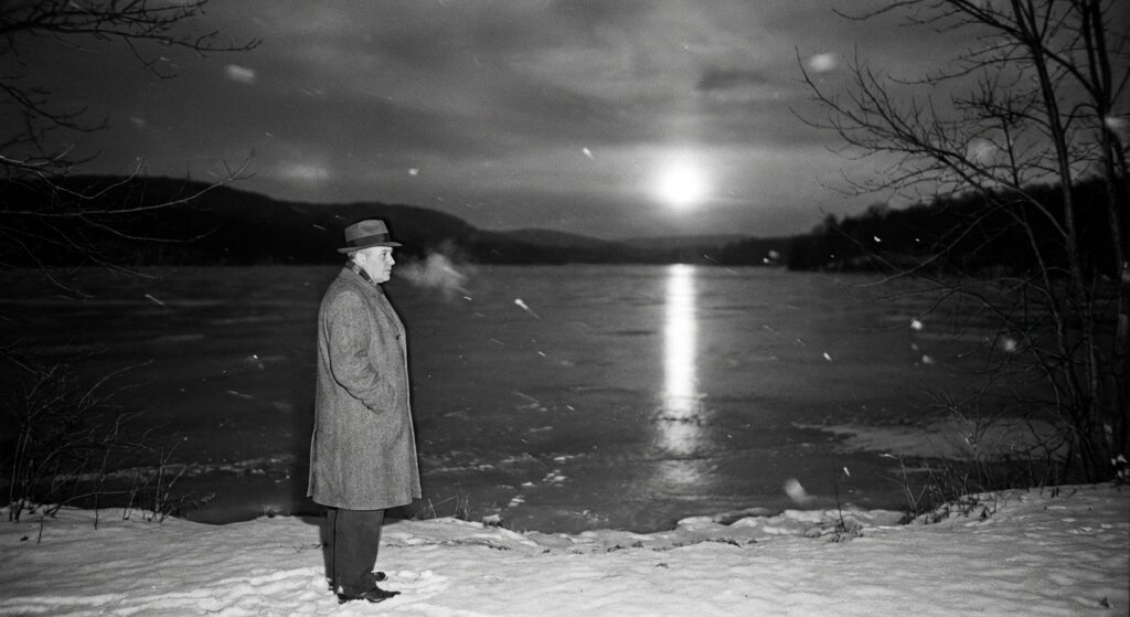 Mayor at frozen reservoir, beam on ice