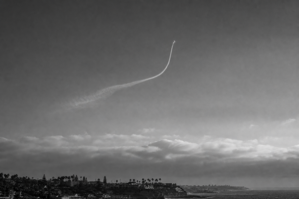 Pale Curved Trail Over San Diego