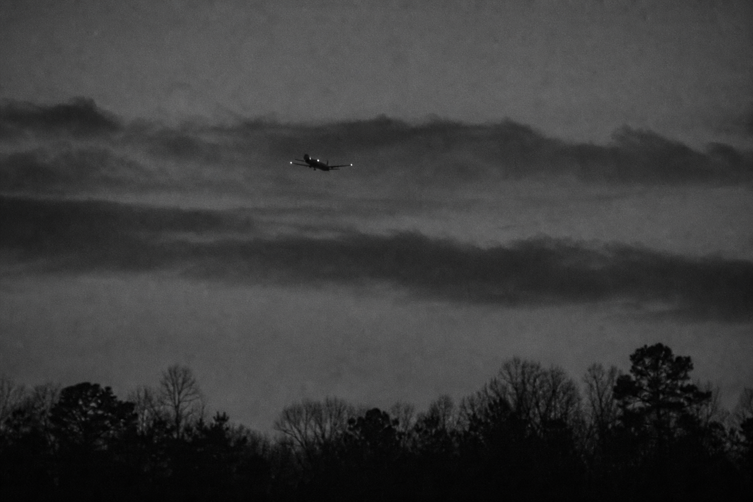 Aircraft Lights in Winter Sky