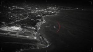 Editorial infrared-style illustration of an object tracked near the Aguadilla coastline